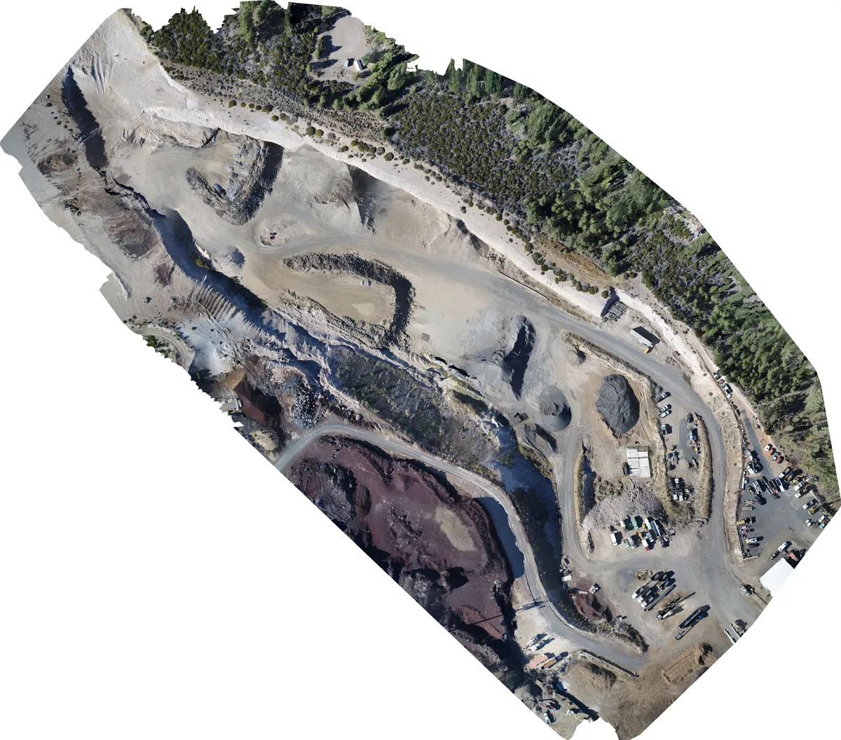 Drone orthomosaic of aggregate stockpiles and excavation in Central Oregon